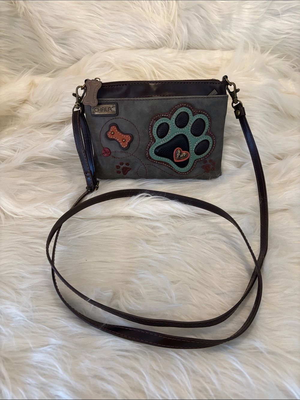 Chala Gray Crossbody Paw Print Bag with Teal & Brown Accents